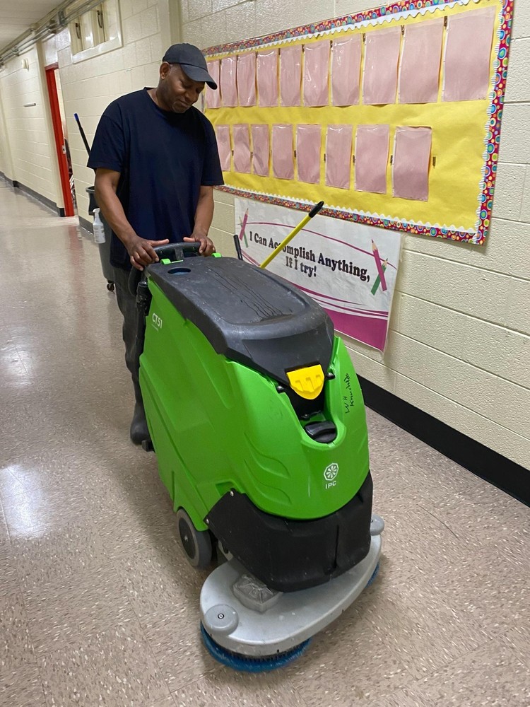 Sylvester Williams cleans school